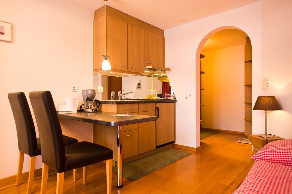 Mom - Alpine Boutique Apartments, Chalet Fagus, Terrace Studio Grindelwald Værelse billede